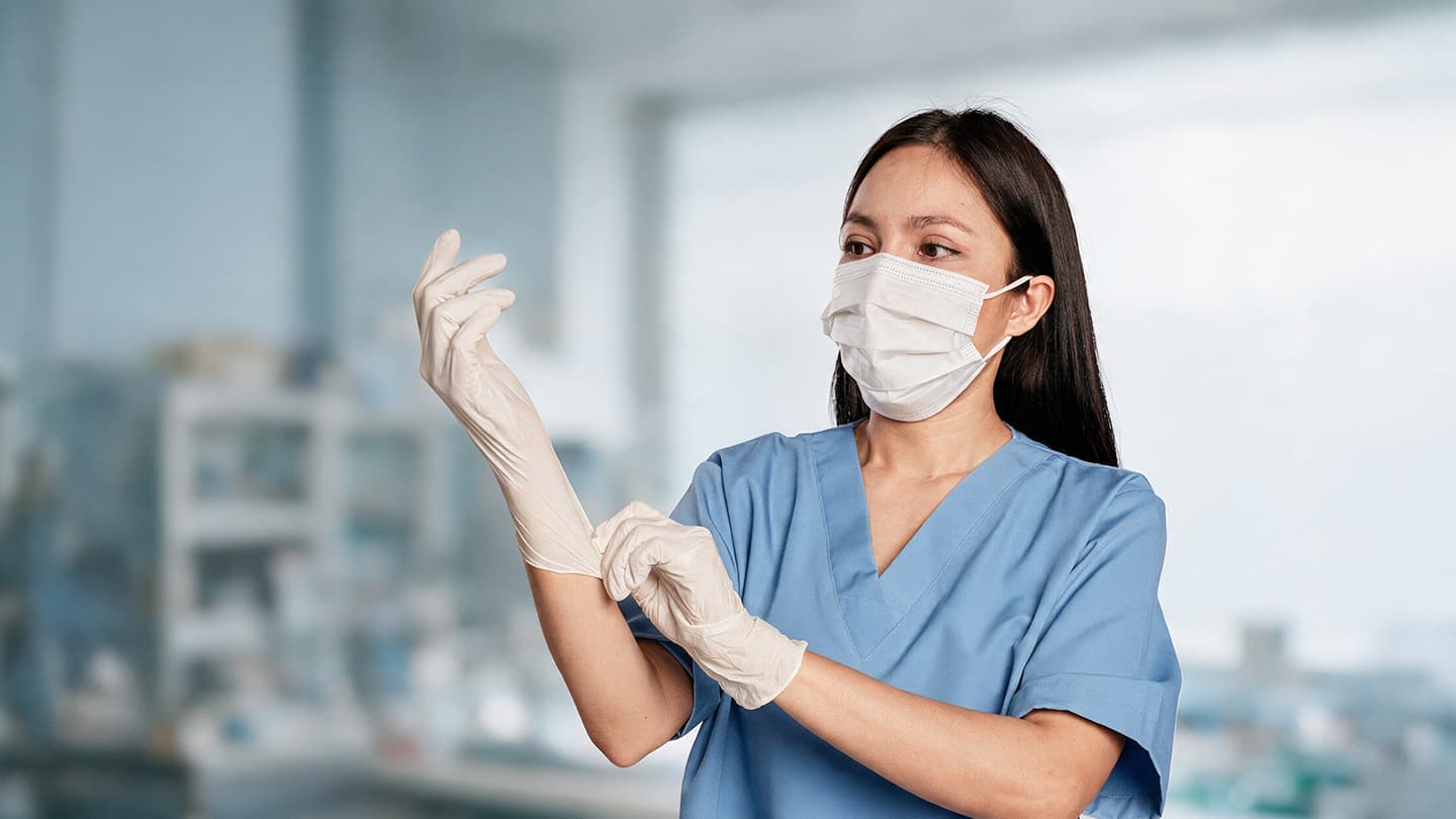 Clinician demonstrating correct protective-glove technique