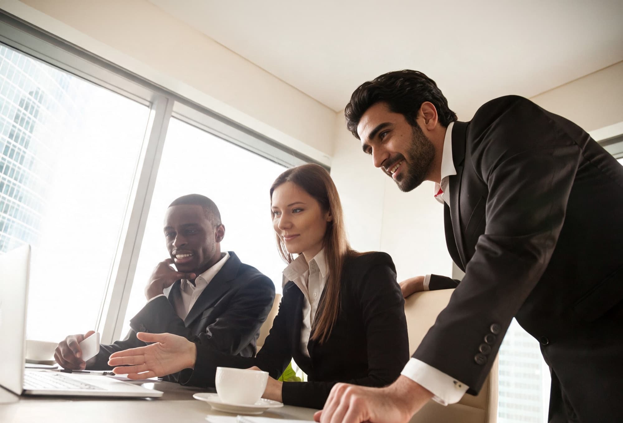HR advisers collaborating on workforce requirements in a professional workplace