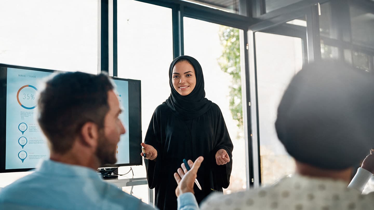 Facilitator leading a professional training session for a business team